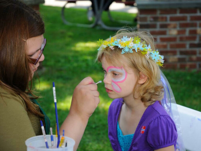 girl having face painted