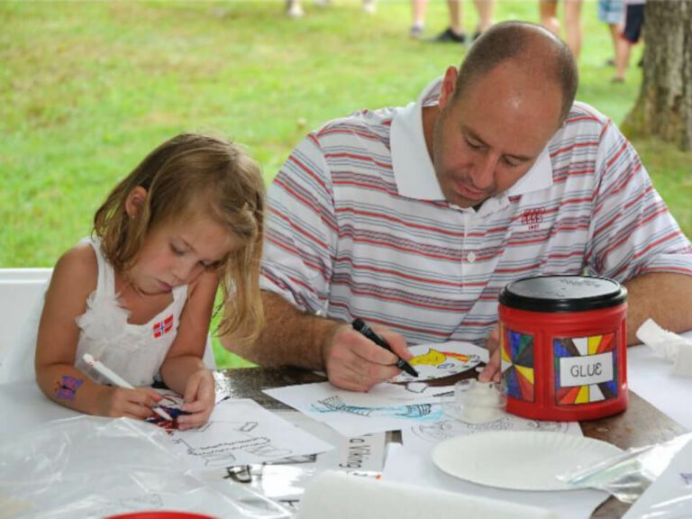 father and daughter doing crafts