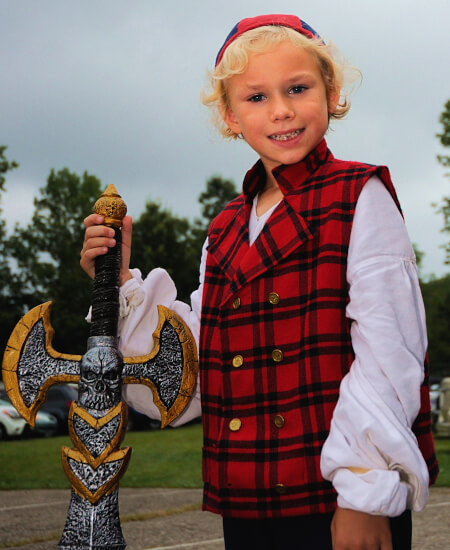 kid posing with sword