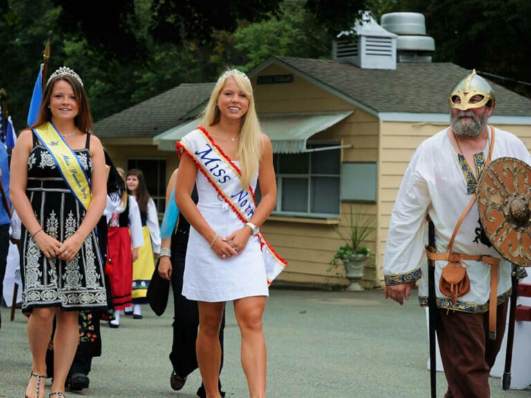 two girls walking with a viking