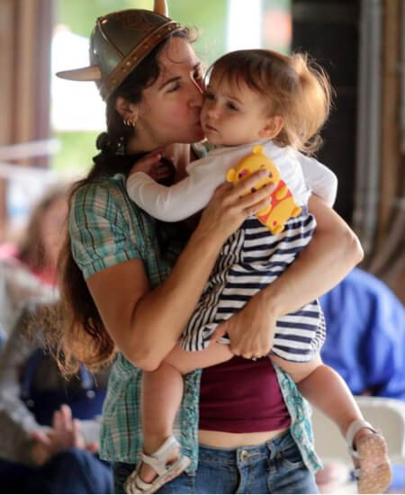 mom kissing son