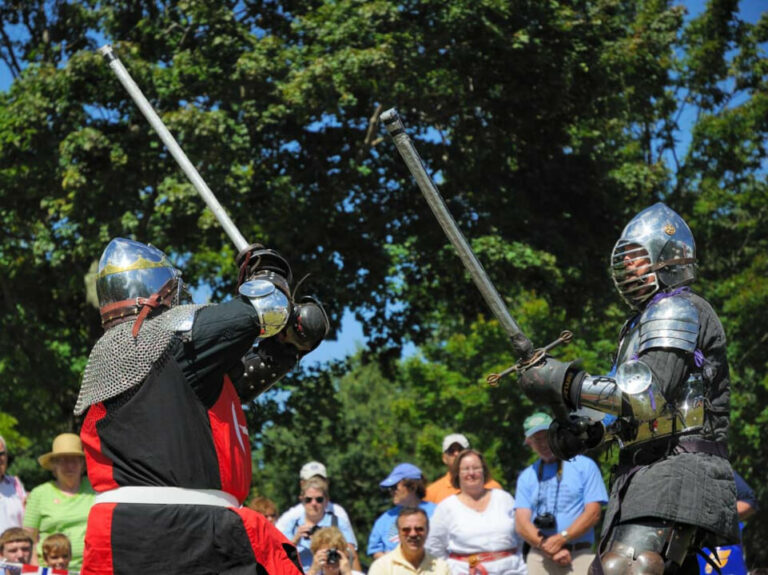 two men demonstrating sword combat