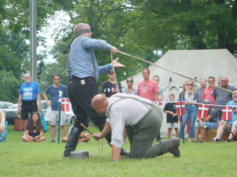 performers demonstrating a game